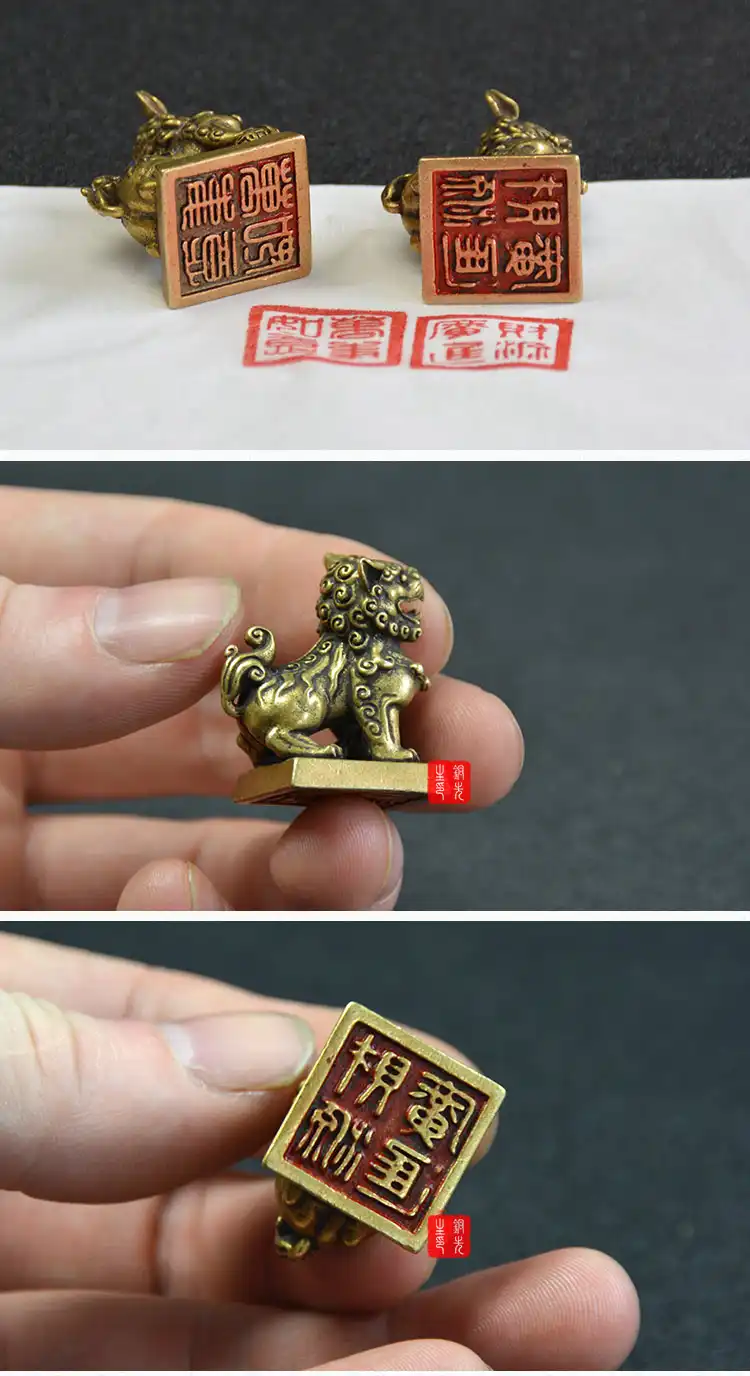 Pair of antique bronze lion seal ornaments made from pure copper for desktop feng shui decoration.