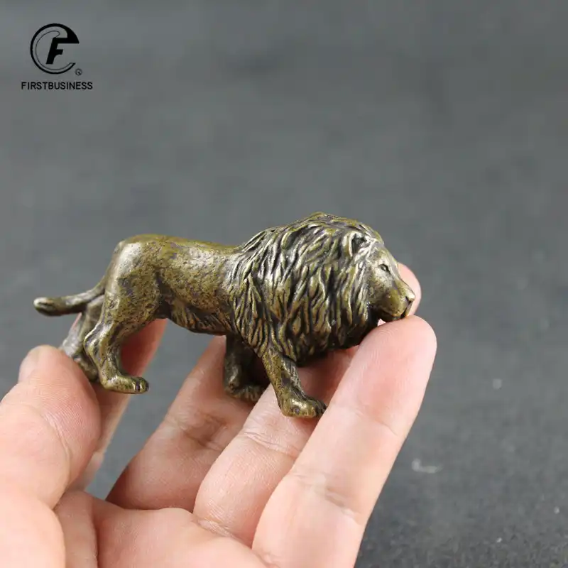 Chinese lion miniature on white background for size reference and product clarity.