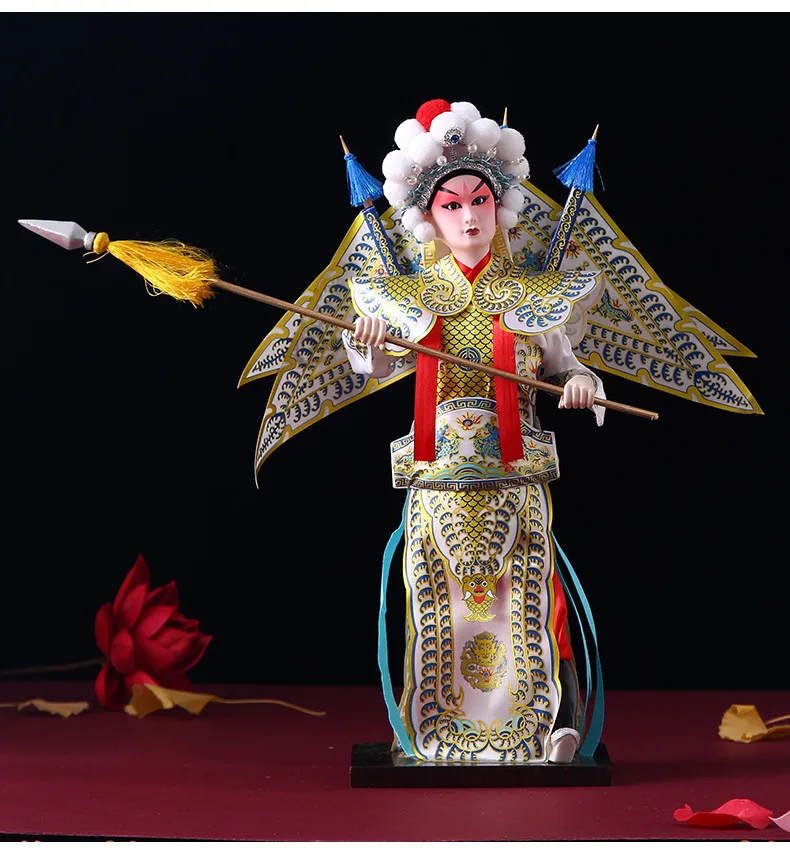 Traditional silk fabric texture and color details on Chinese opera character figurine.