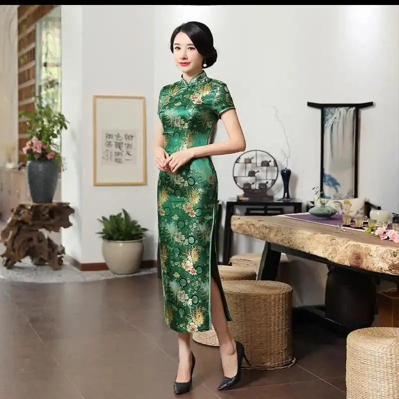 Model in green cheongsam dress for wedding showing mid-calf length and formal style.