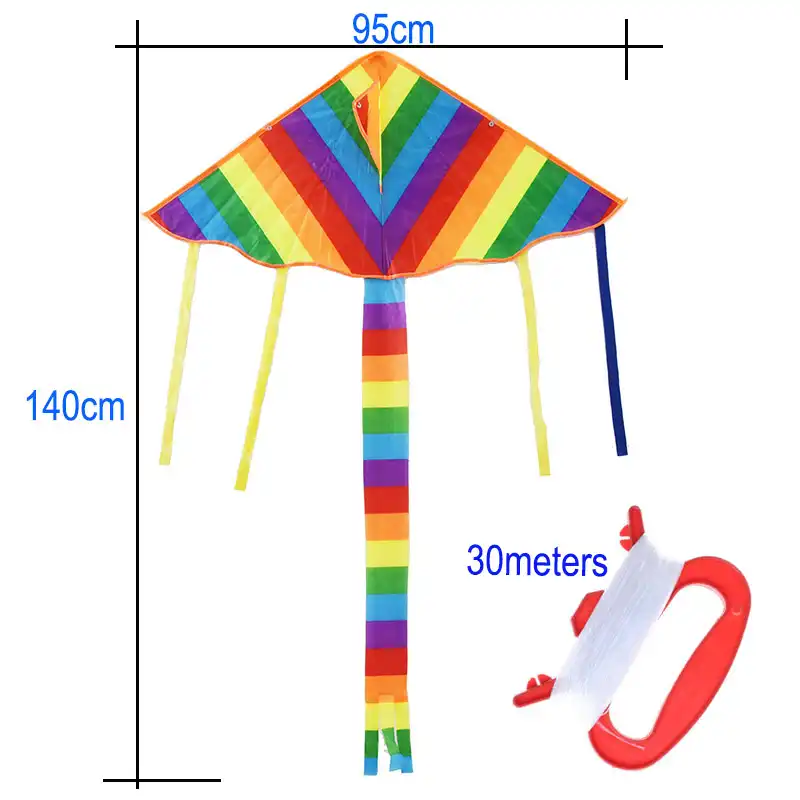 Young boy successfully flying rainbow triangle kite in open grassy field during daytime.