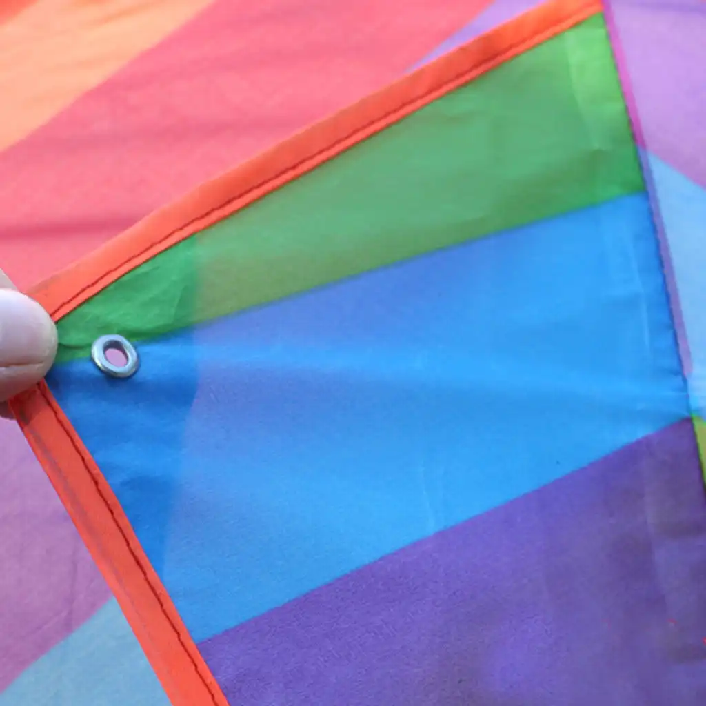 Detailed view of triangle kite corner showing durable nylon construction and secure stitching.