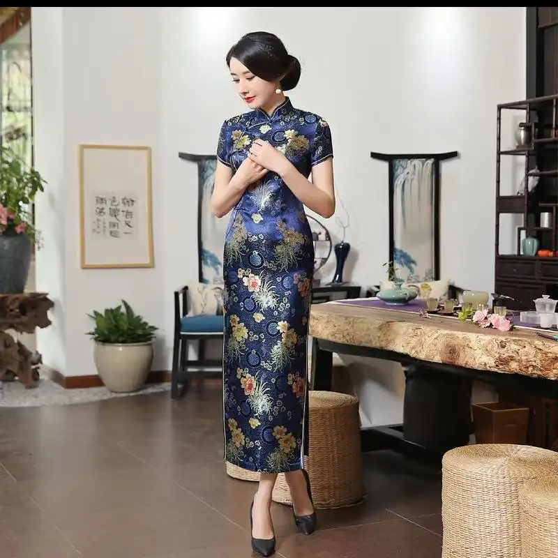 Model wearing green cheongsam dress demonstrating plus size fit in XXXL sizing option.