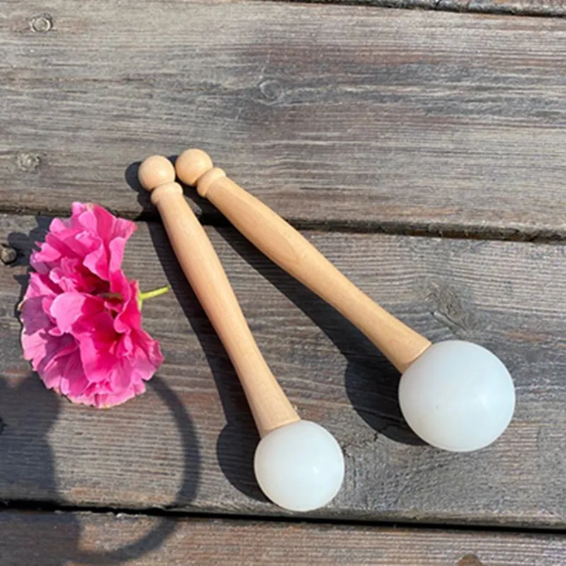 Both mallets side by side showing size comparison and different material construction types.