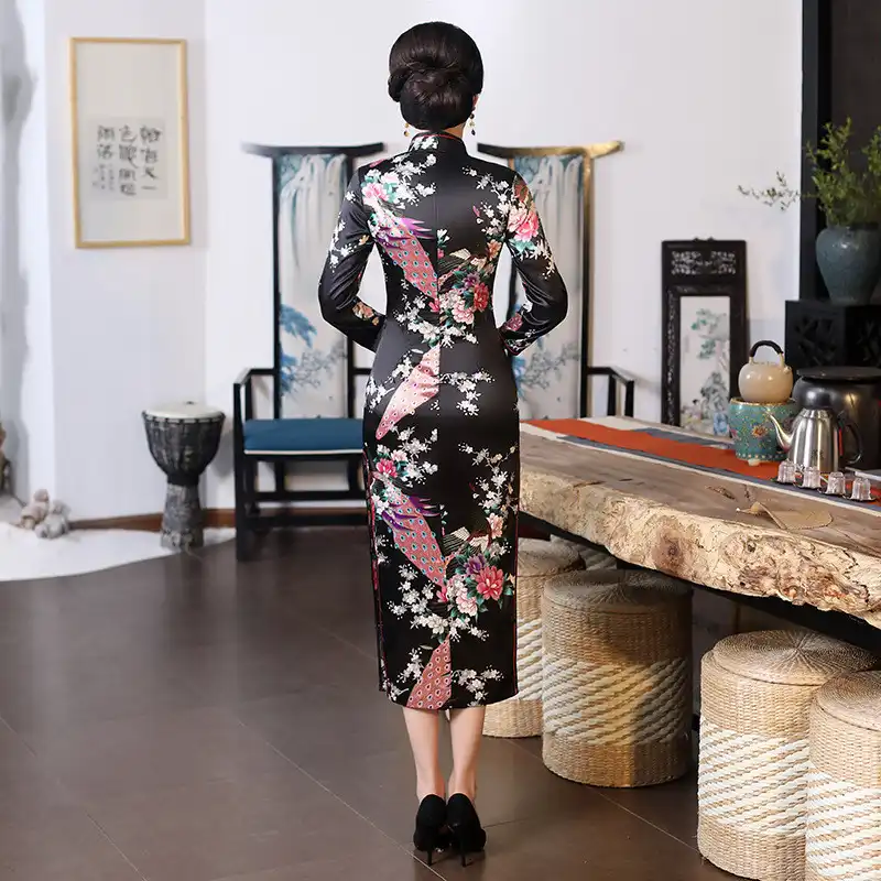 Model wearing purple cheongsam in professional setting showing appropriate styling.