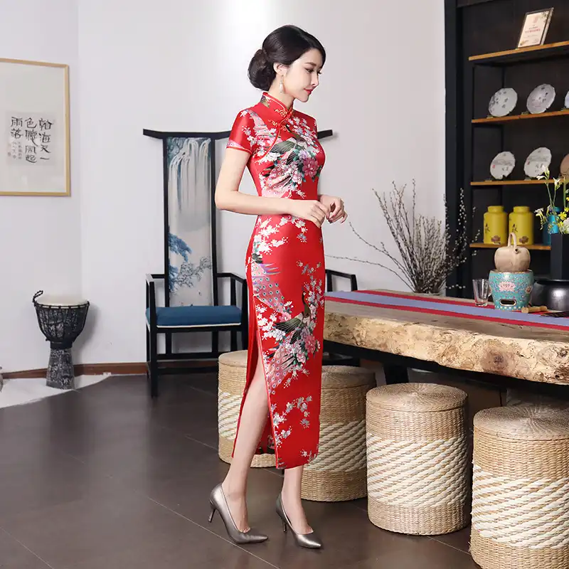 Back view of purple satin qipao showing elegant silhouette and quality construction.