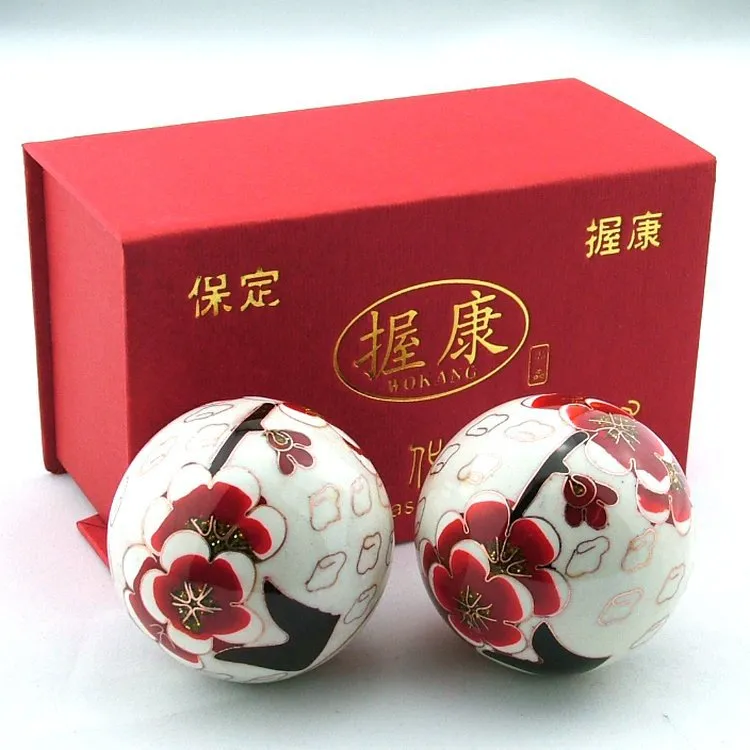 Complete meditation ball gift set with red wooden box packaging and instruction materials.