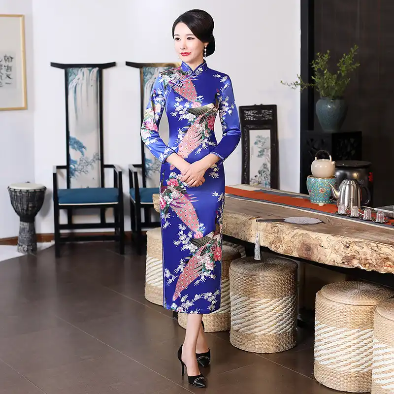 Model in purple satin qipao for formal occasion showing elegant sophisticated styling.