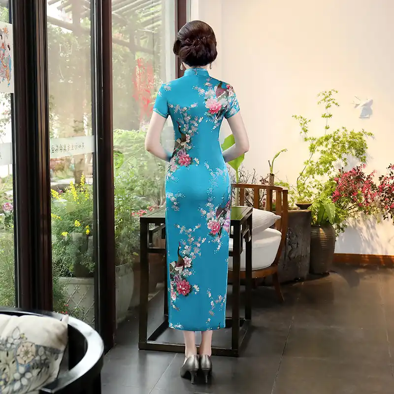 Purple satin cheongsam dress packaging and presentation for gift or special purchase.