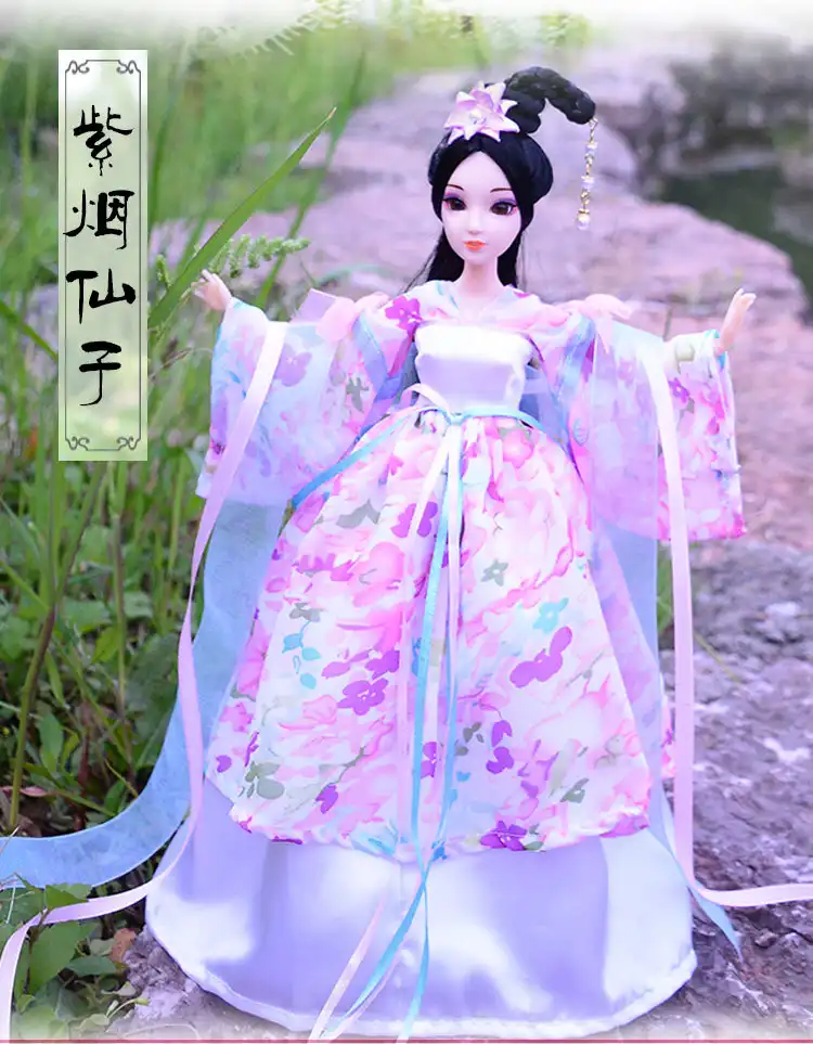 Full body view of imperial concubine doll wearing complete ancient Chinese court costume.