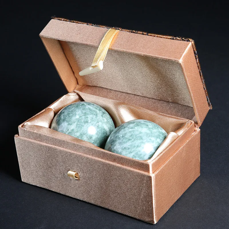 Natural green jade Baoding balls 50mm diameter with gift box showing premium quality and elegant presentation.