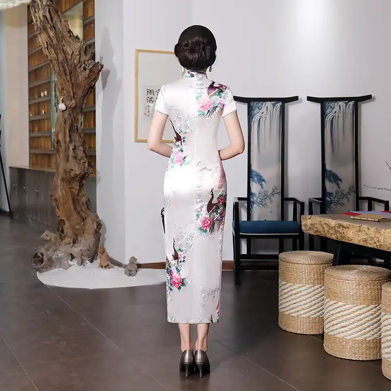 Purple qipao dress fabric draping and movement demonstration for comfort assessment.