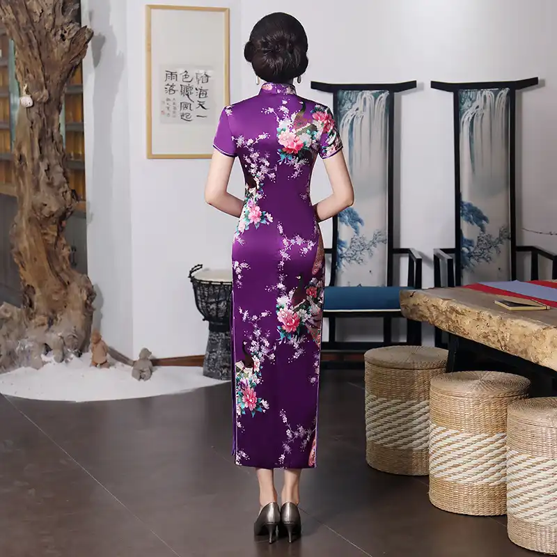 Model wearing purple qipao demonstrating plus size fit in larger sizing options.