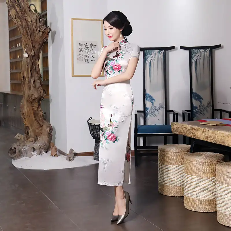 Purple cheongsam dress care instructions and fabric composition information display.