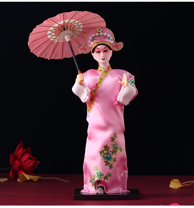 Traditional Chinese opera costume details and silk fabric quality on figurine.