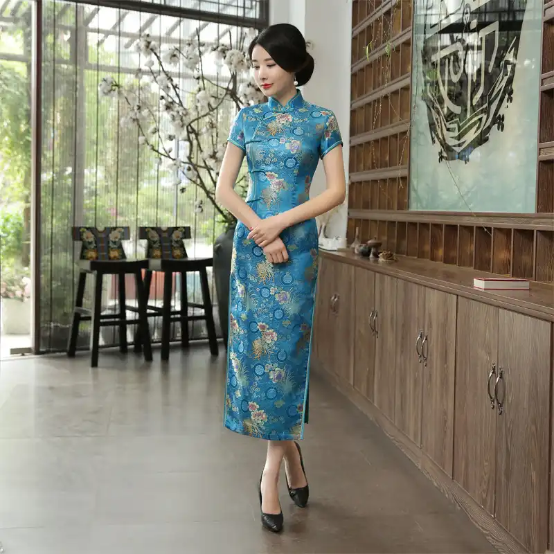 Green cheongsam dress styled for evening party showing versatile formal wear option.