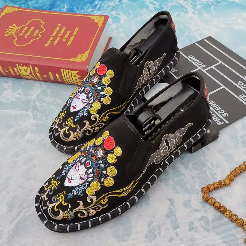 Multiple color variations of Chinese traditional embroidered women's flat shoes.