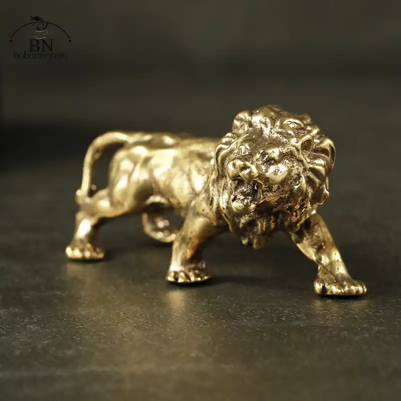 Gift presentation of antique bronze lion figurine in protective packaging ready for shipping.