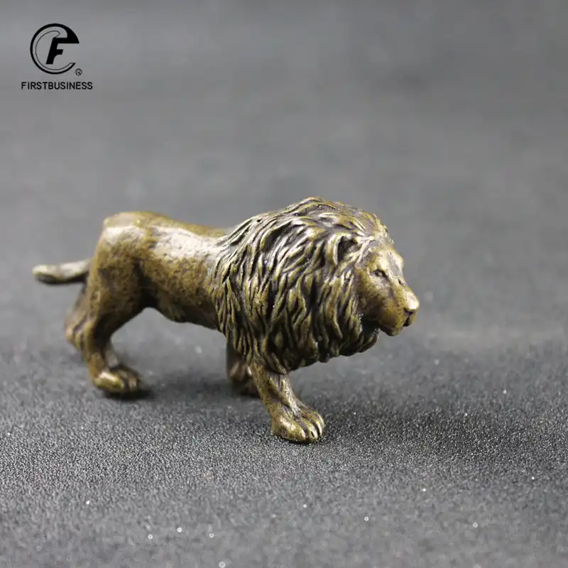 Bronze lion statue detail shot highlighting copper material and finish quality.