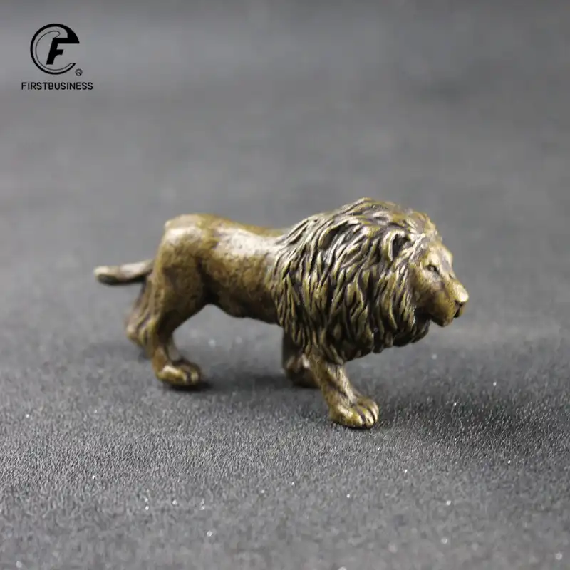 Antique style lion figurine on elegant display stand in collector showcase.