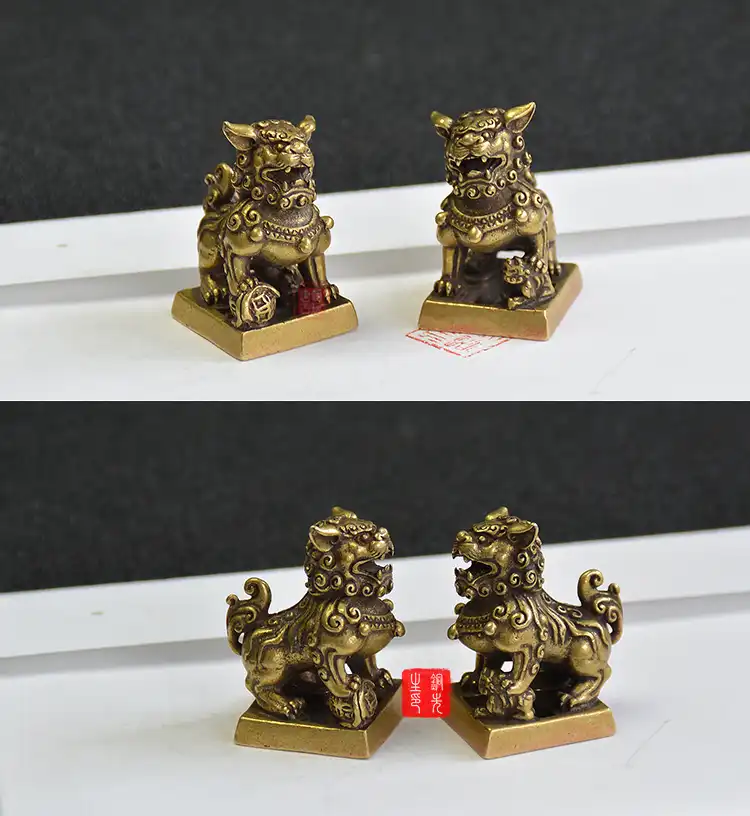 Bronze lion seal pair positioned on modern desk demonstrating compact size and decorative appeal.