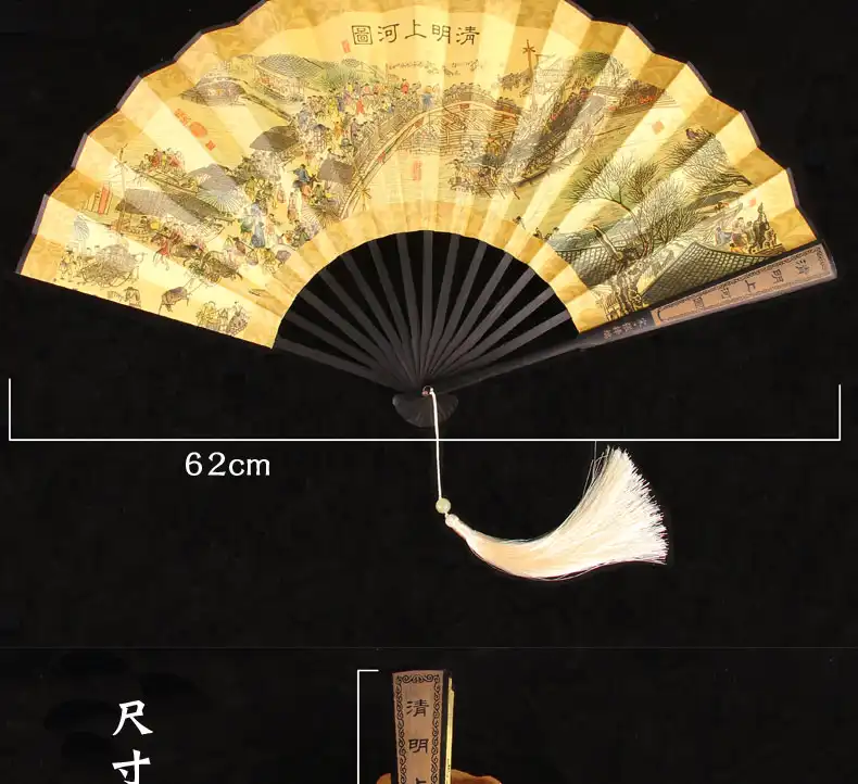 Elegant tassel decoration on mens fan adding visual interest and traditional appeal.