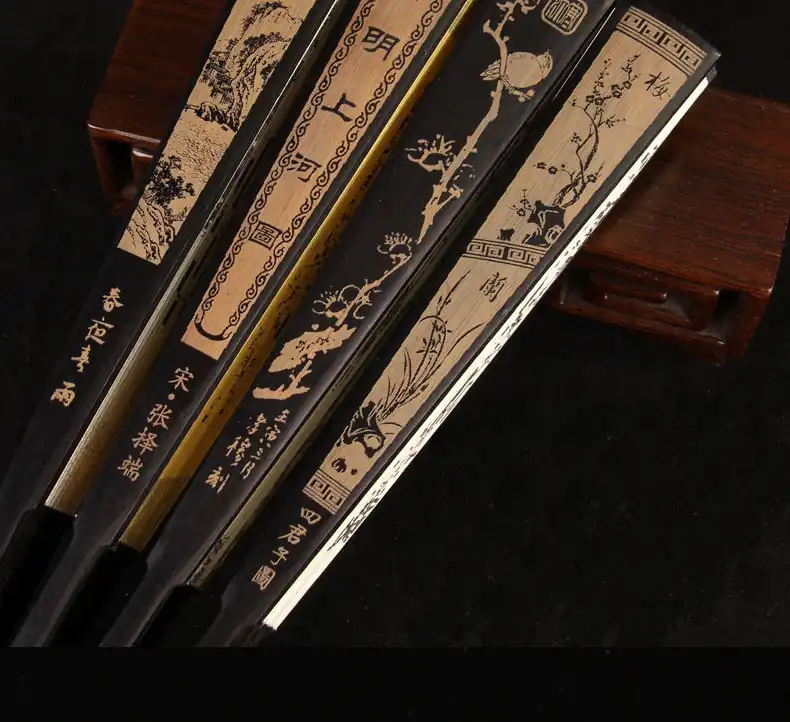 Daily carry items including portable Japanese folding fan for modern gentleman.