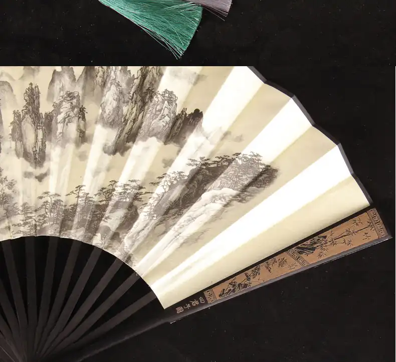 Portable design of large folding fan fitting easily in briefcase or travel bag.