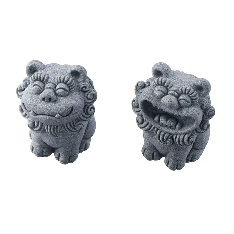 Side view of stone guardian lion sculpture displaying traditional Chinese artistic elements and proportions.