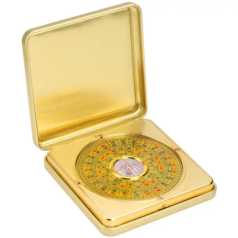 Traditional Chinese geomantic compass displaying 24 directional segments and ancient symbols.