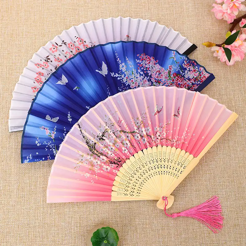 Halloween party decoration featuring Chinese folding fans as festive room decor elements.