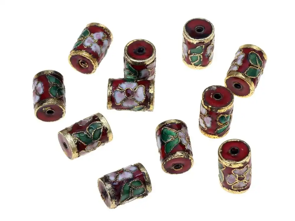 Close-up view of wheel-shaped cloisonne copper beads showing detailed enamel craftsmanship.