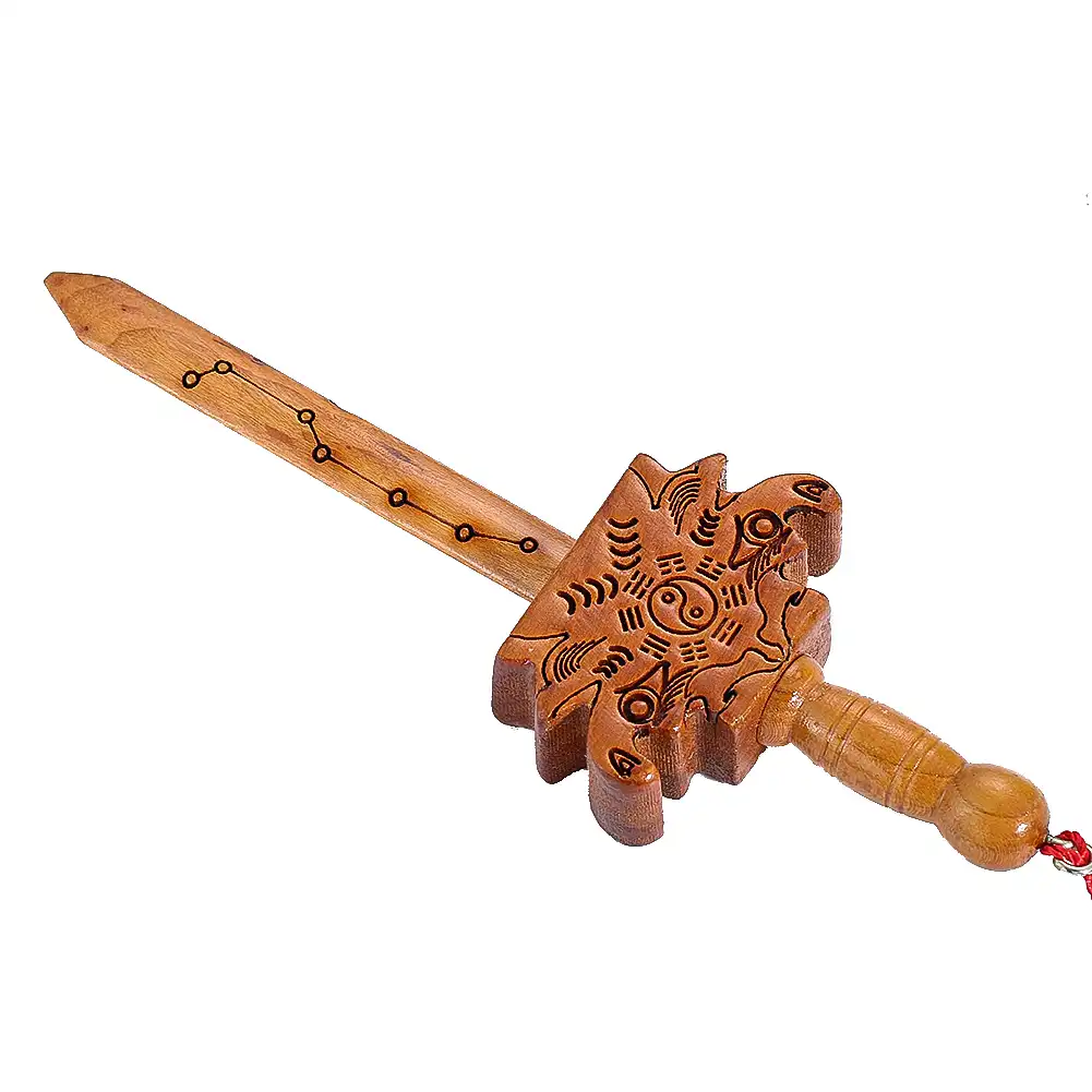 Full length view of 20.5cm peach wood sword showing traditional Chinese dragon carving artwork.