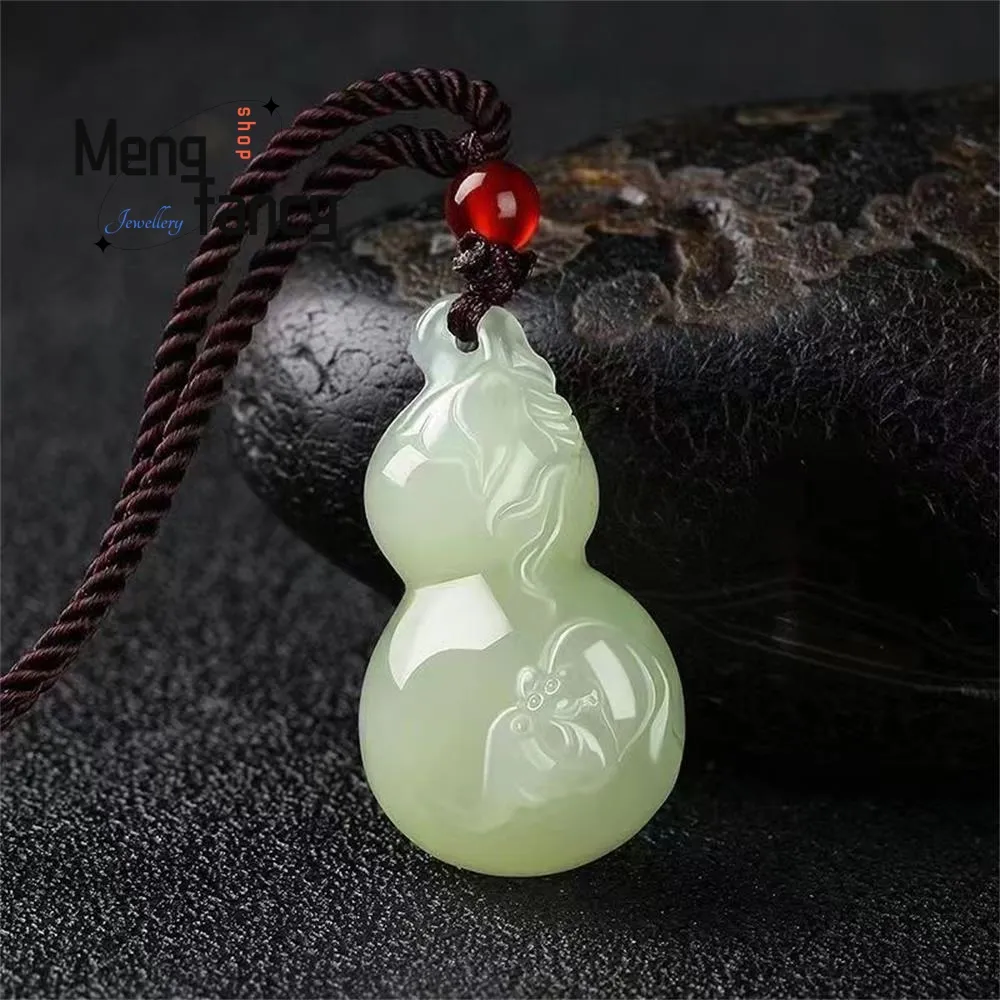 Hetian jade gourd pendant worn as necklace demonstrating size and elegant appearance on model.