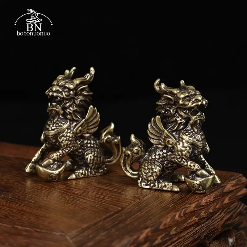 Bronze Qilin statue in elegant home setting on wooden table as feng shui decoration.