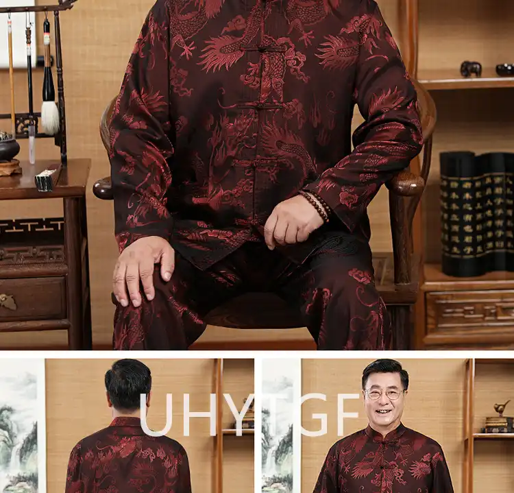 Close up detail of golden dragon embroidery on black silk Tang suit jacket sleeve and chest area.