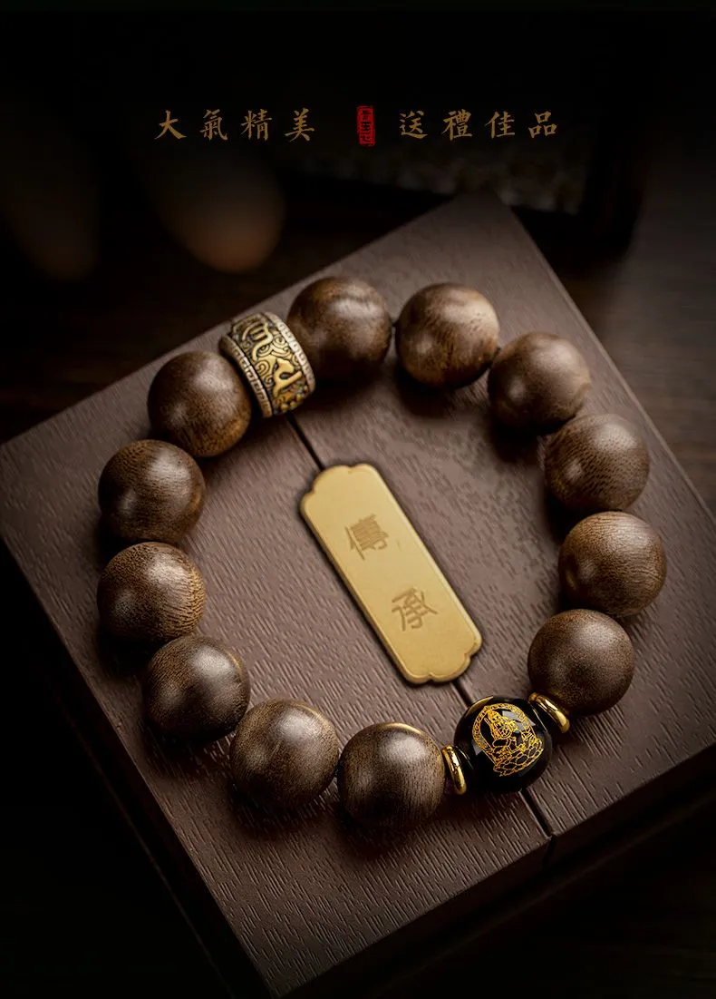Close-up view of premium agarwood wood grain texture on individual prayer bracelet beads.
