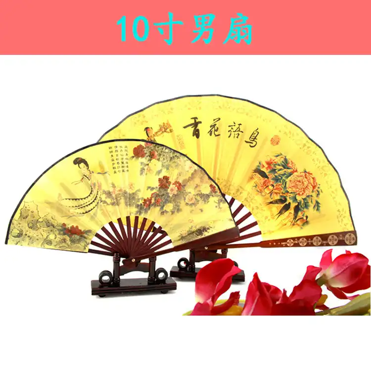 Traditional Chinese bamboo folding fan closed showing compact 33cm length and elegant bamboo handle design.
