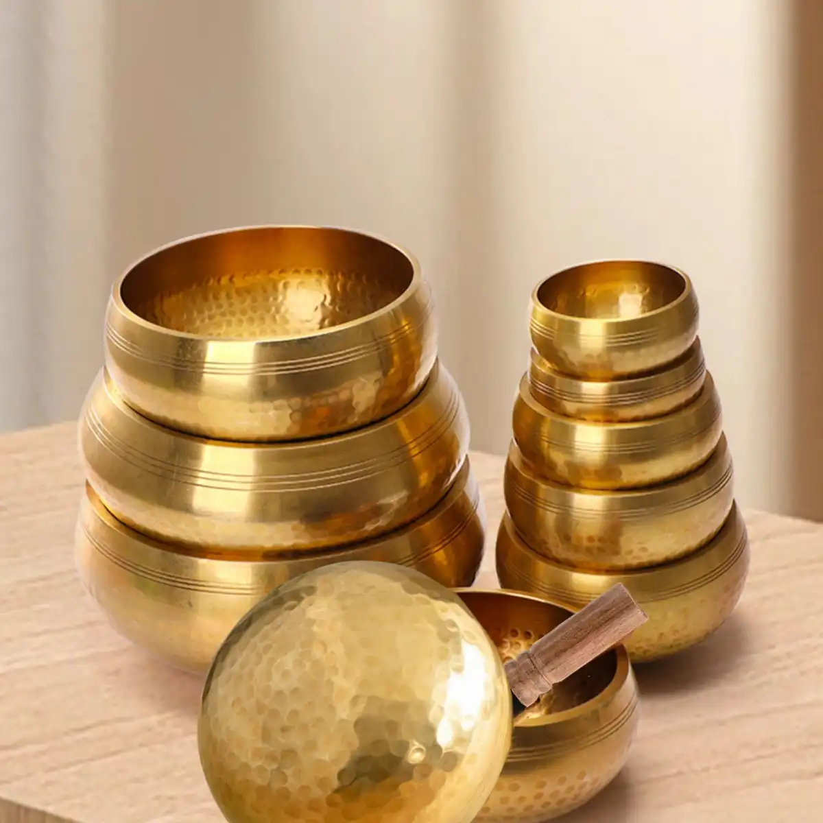 Complete Tibetan singing bowl set with handcrafted brass bowl, leather striker, and cushion.