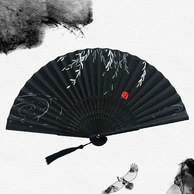 Black bamboo silk folding fan for women opened displaying elegant traditional Chinese design.