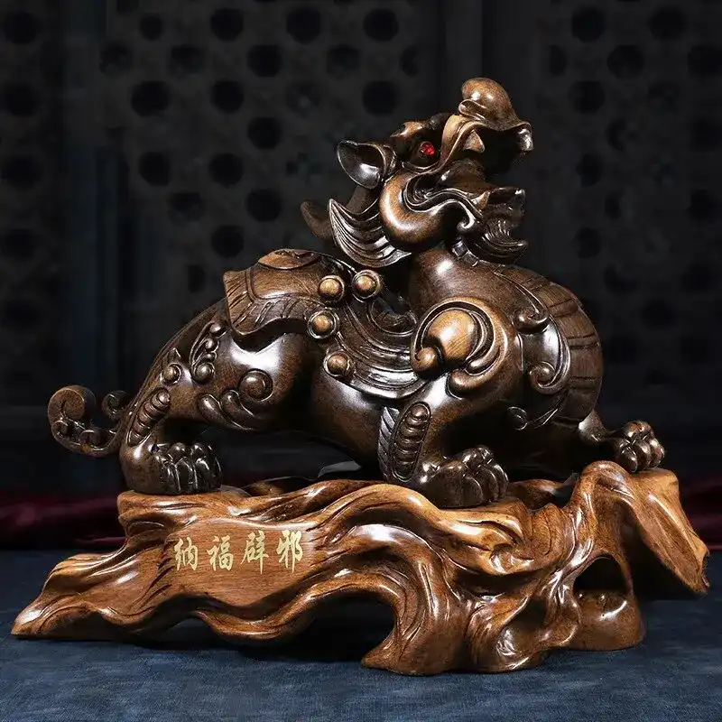 Golden Pixiu statue positioned on office desk highlighting workplace wealth attraction and protection benefits.