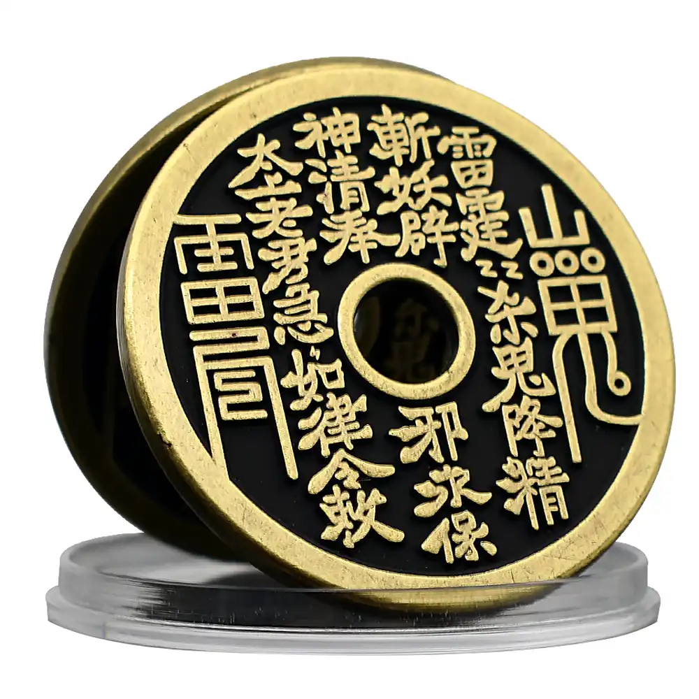 Close-up view of ancient bagua symbols engraved on metal commemorative coins.