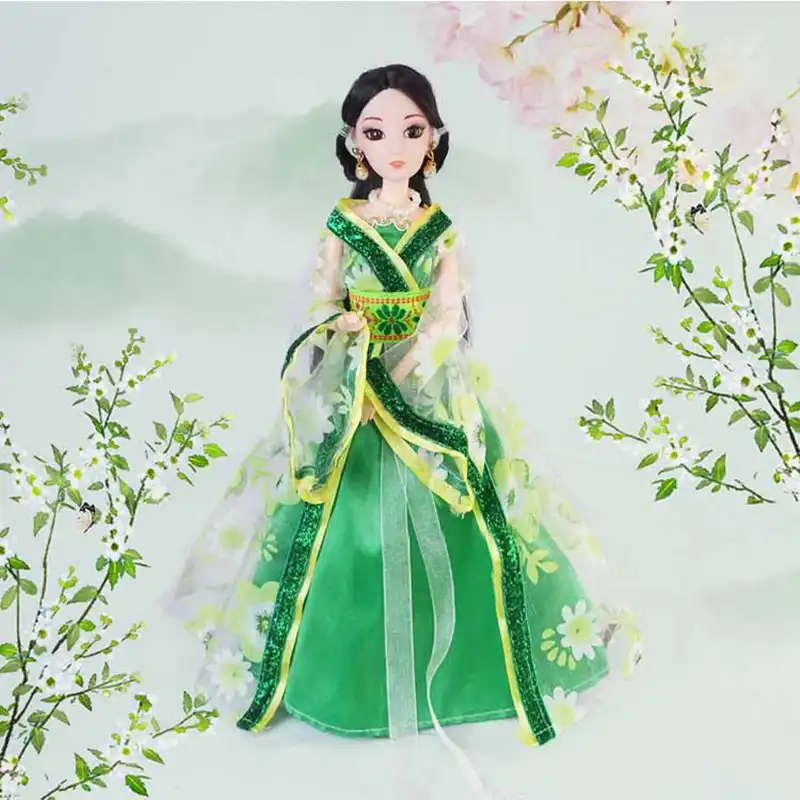 Detail shot of Chinese costume doll headwear showing intricate traditional design elements.