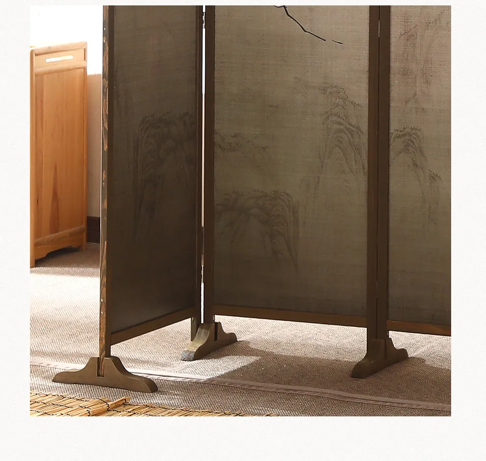 Chinese screen positioned in tea room creating intimate seating area ambiance.
