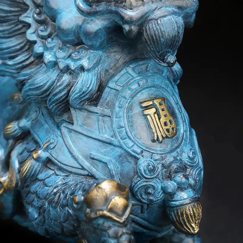 Traditional Chinese Kirin statue showcasing hand-painted wind and fire elements in vibrant colors.