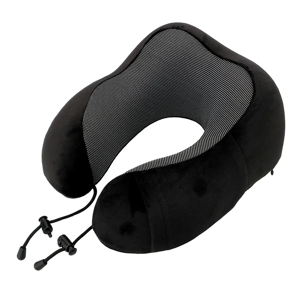 Lightweight portable travel pillow being packed in carry-on luggage demonstrating convenience.