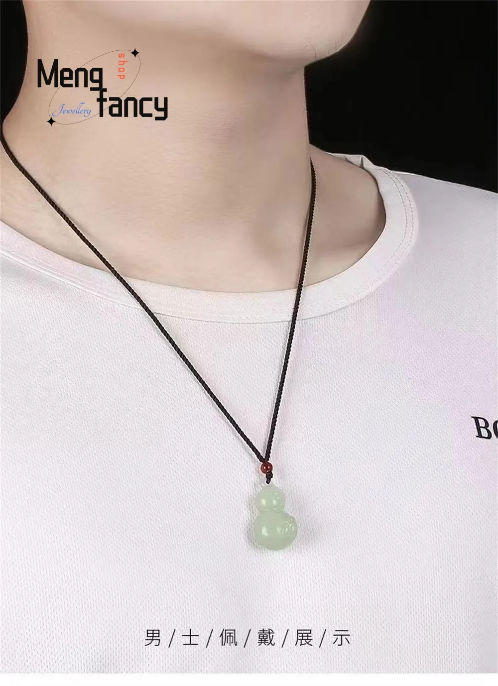 Close-up view of jade gourd pendant displaying natural stone texture and geometric shape patterns.