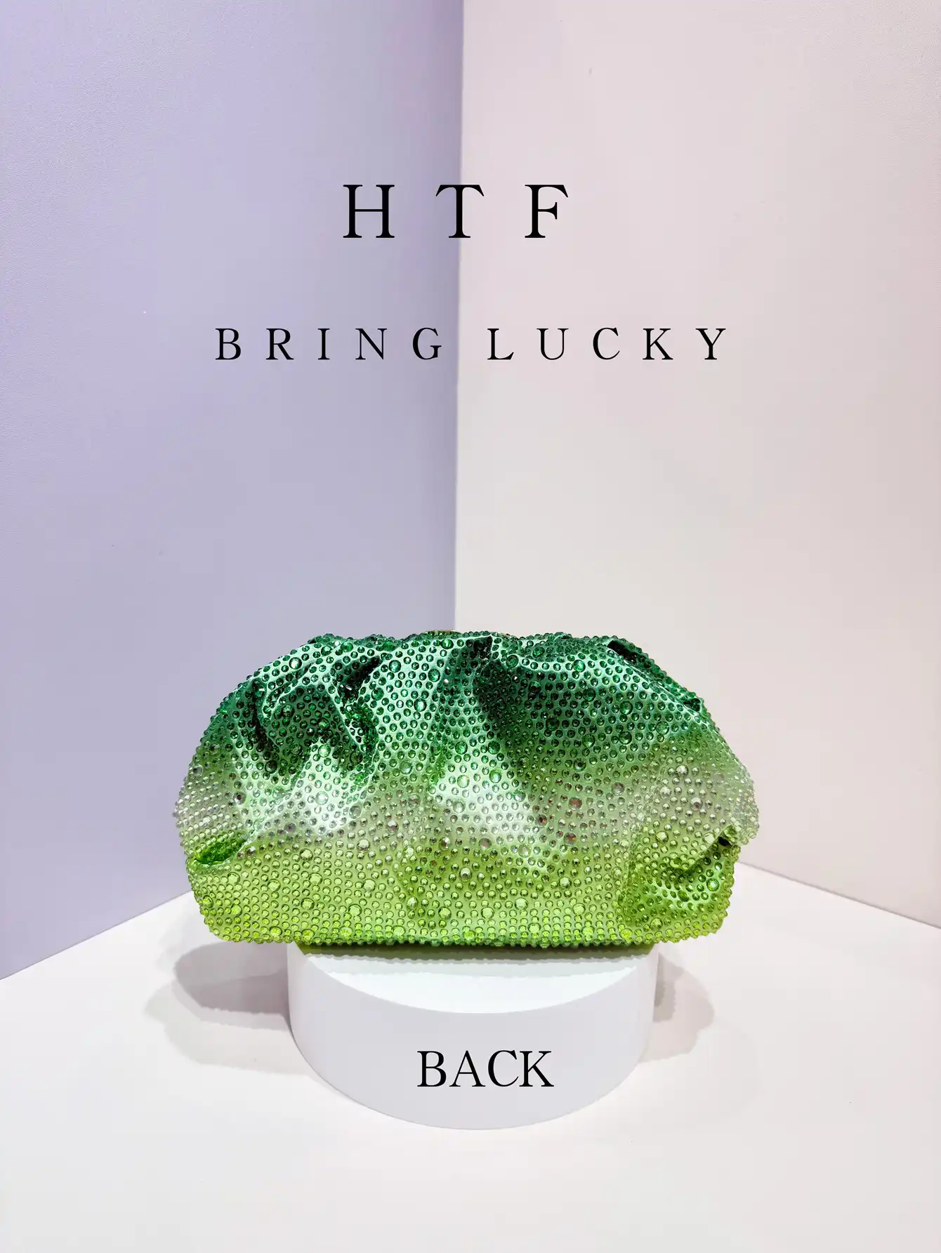 Close-up view of dazzling rhinestone embellishments and diamond details on bucket purse.