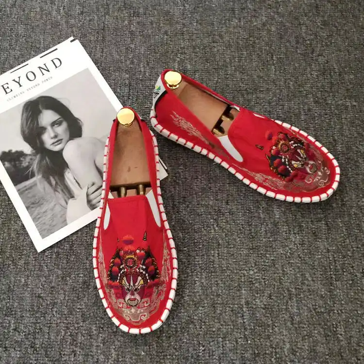 Side profile view of Old Beijing cloth shoes showing slip-on design and traditional construction.