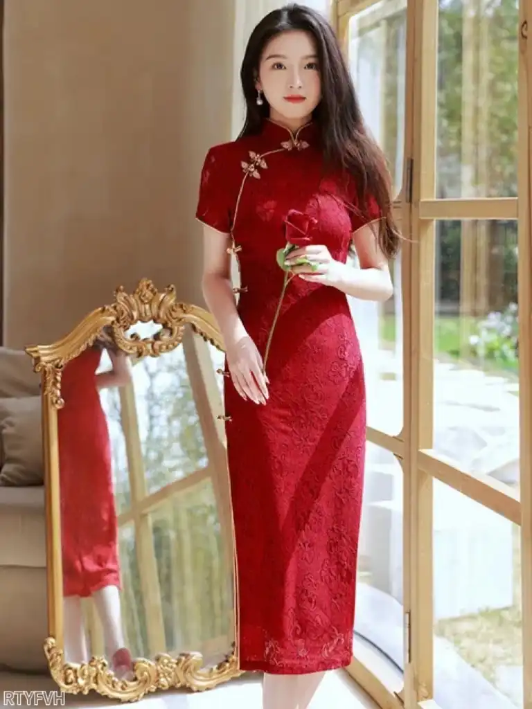 Model in wine red wedding cheongsam for ceremony showing formal bridal elegance.